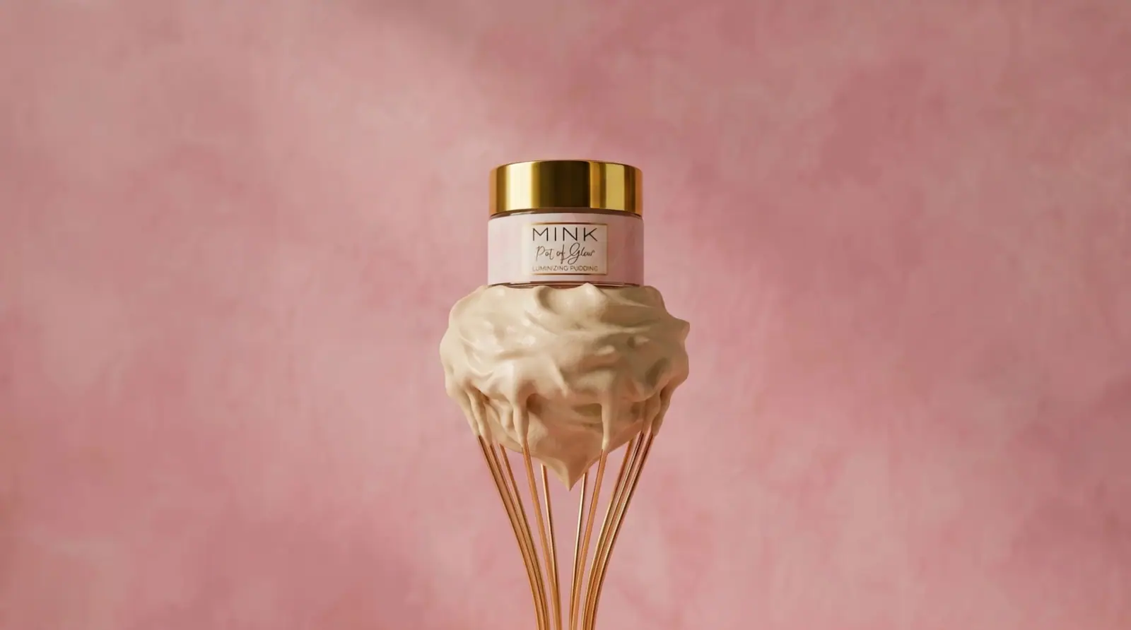 MINK Pot of Glow jar resting on a gold whisk of whipped cream